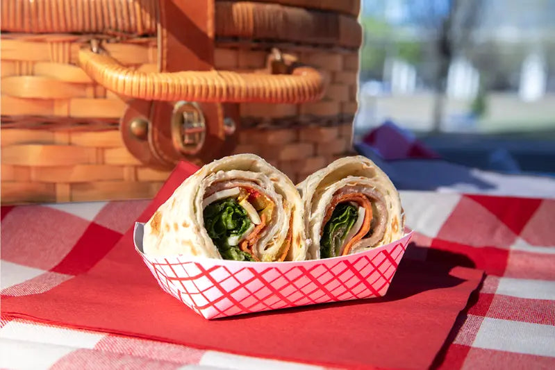 1/4 lb. compostable food tray with two half burritos