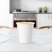 Dart Solo 10 oz. White SSP Paper Hot Cup - Sleeve of 50 - #510W Dart Container