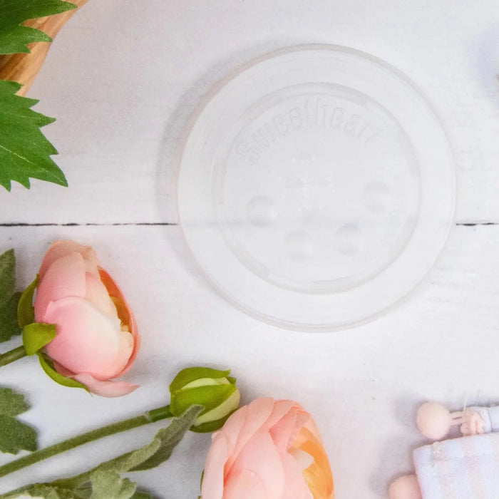 Dart Solo 12-24 oz. Translucent HIPS Plastic Straw-Slotted Lid with ID Buttons - Sleeve of 125 - #L16BL-0100 Dart Container