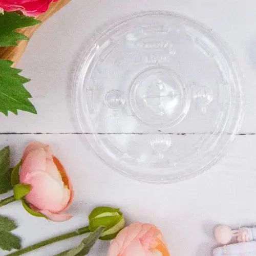 Dart 30-32 oz. Clear PET Plastic Straw-Slotted Lid with ID Buttons - Sleeve of 100 - #L32CR