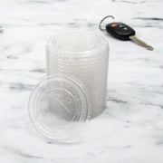 Dart 2 oz. PET Clear Plastic Soufflé Cup Lid - Sleeve of 125 - #PL200N Dart Container