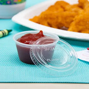 Dart 2 oz. PET Clear Plastic Soufflé Cup Lid - Sleeve of 125 - #PL200N Dart Container