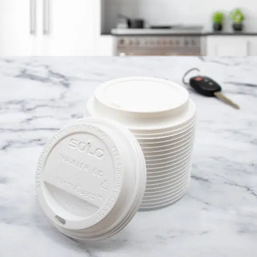 Dart Solo 12-24 oz. White HIPS Plastic Traveler® Lid with Sip Hole - Sleeve of 120 - #TL1224TG